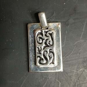 Square silvertone swirl design pendant